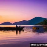 말라위에서 가장 아름다운 일출 일몰 명소 - **Prompt: Serene Lake Malawi Sunset at Cape Maclear**
    A wide-angle, realistic photographic image...